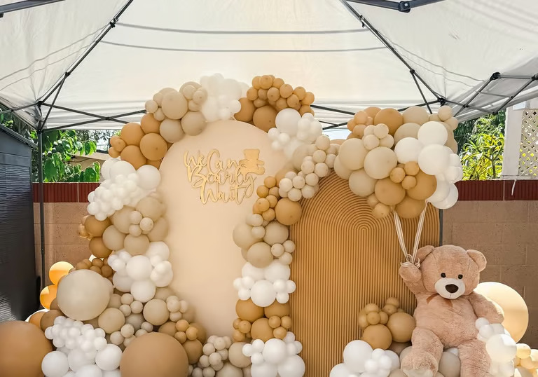 Large organic pastel balloon arch for a baby shower in Bristol by Ignition Signature Events.