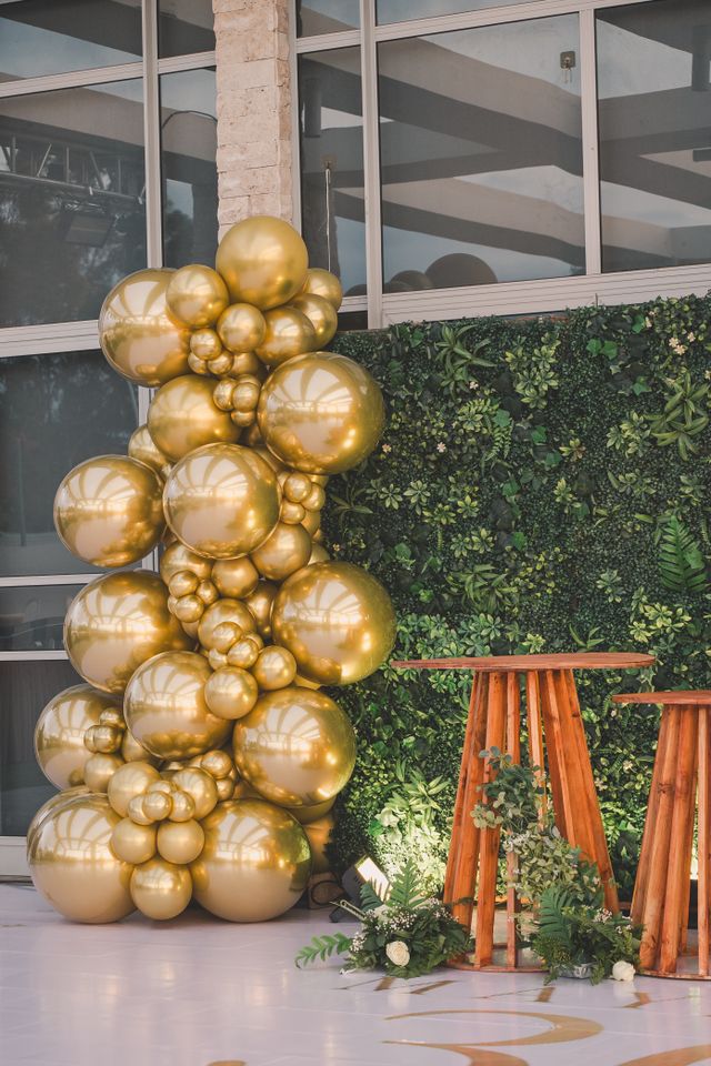 Custom Christmas balloon arch and entryway styling for a corporate party in Gloucester