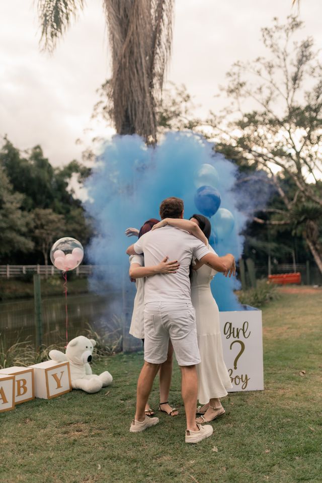 Neutral balloon garland styling with gender reveal balloon box for a combined Bristol celebration