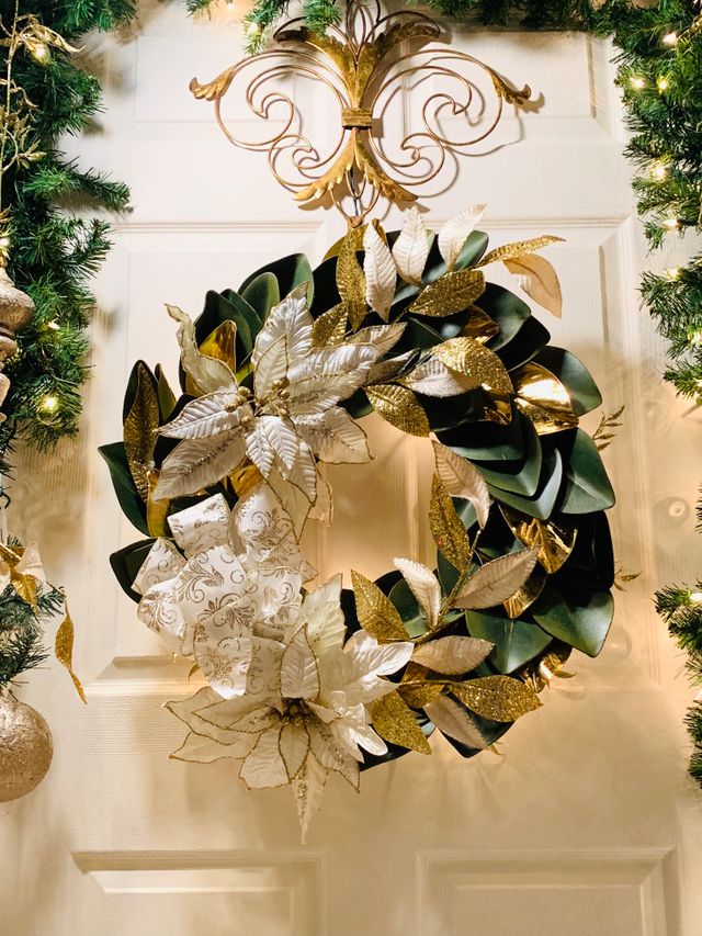 Professionally styled luxury Christmas wreath in burgundy and gold on a Bristol home