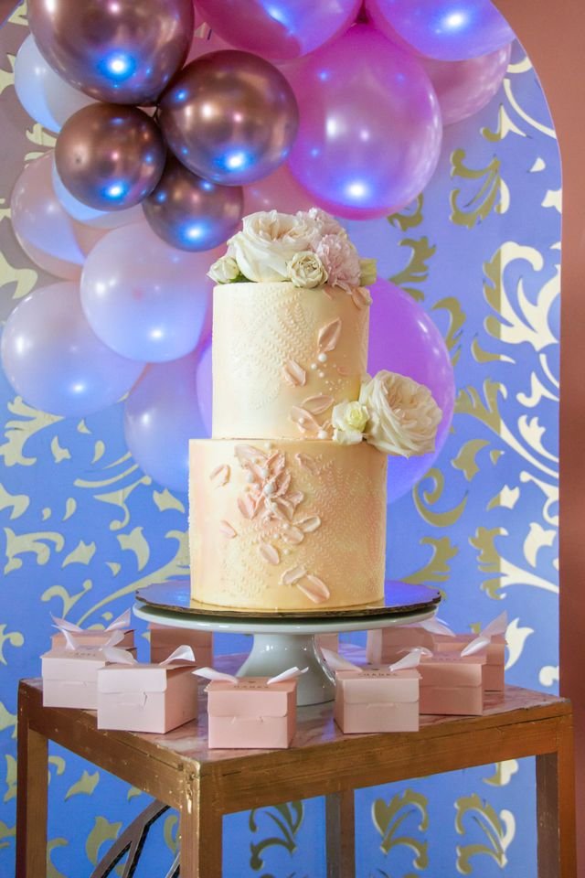 Rose gold and champagne table styling for a 40th birthday celebration